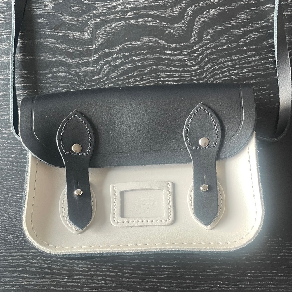 Like new. The Cambridge Satchel Company Black and White Mini Satchel Crossbody